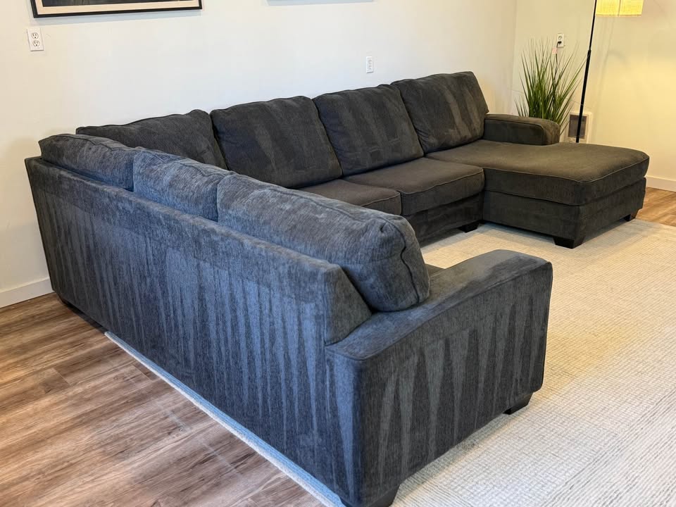 Ashley furniture dark gray sectional couch delivery available
