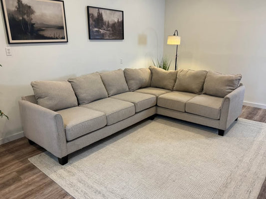 Beige sectional couch delivery available