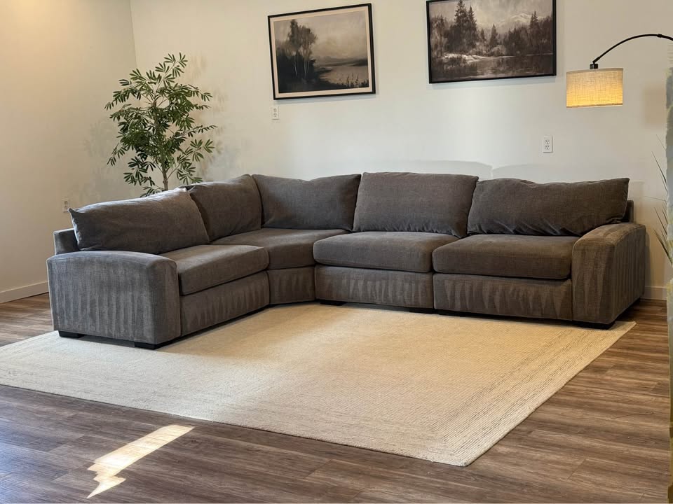 Gray 4-piece sectional couch delivery available